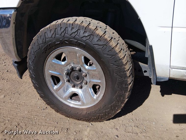 image for item EU2634 2020 RAM 3500 Crew Cab flatbed pickup truck