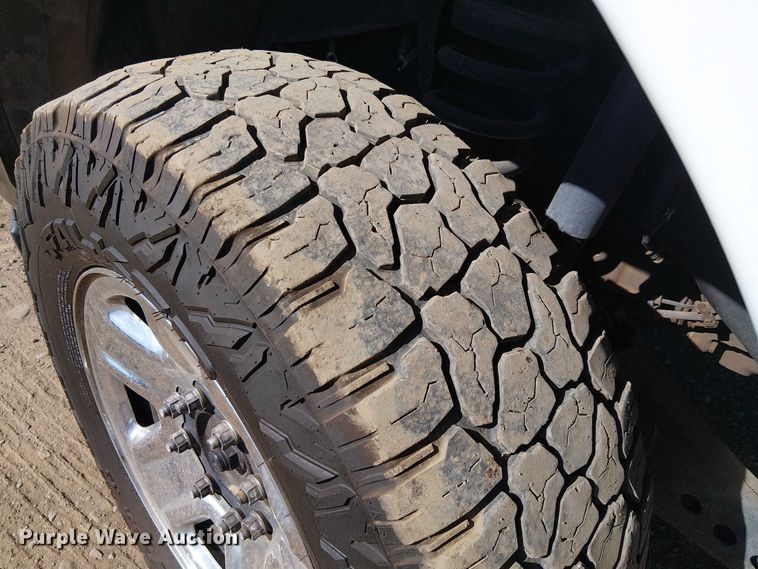 image for item EU2634 2020 RAM 3500 Crew Cab flatbed pickup truck