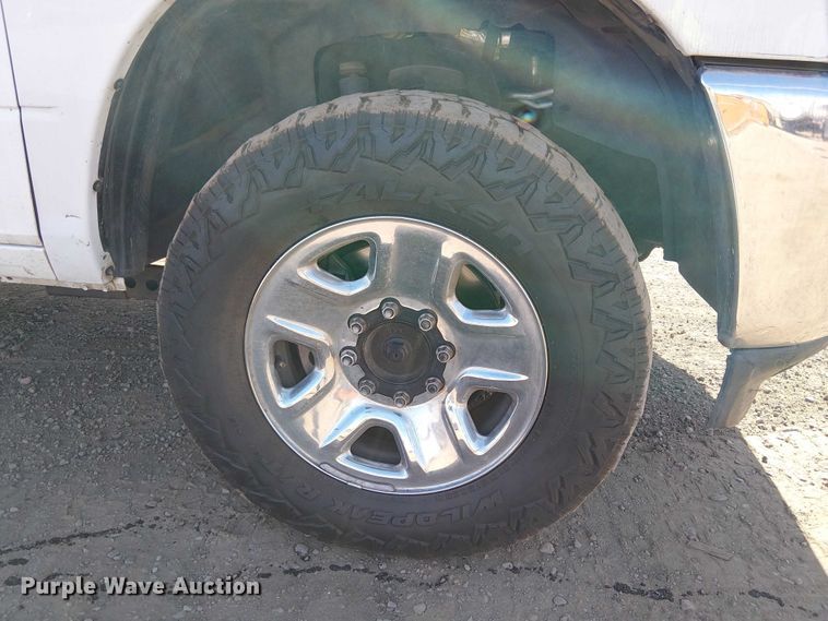 image for item EU2634 2020 RAM 3500 Crew Cab flatbed pickup truck