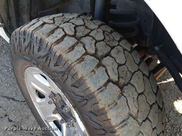 image for item EU2634 2020 RAM 3500 Crew Cab flatbed pickup truck