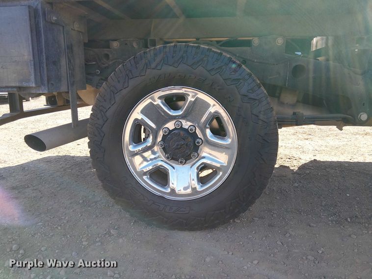 image for item EU2634 2020 RAM 3500 Crew Cab flatbed pickup truck