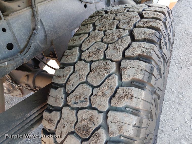 image for item EU2634 2020 RAM 3500 Crew Cab flatbed pickup truck