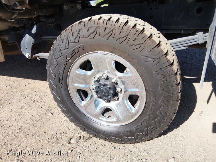 image for item EU2634 2020 RAM 3500 Crew Cab flatbed pickup truck