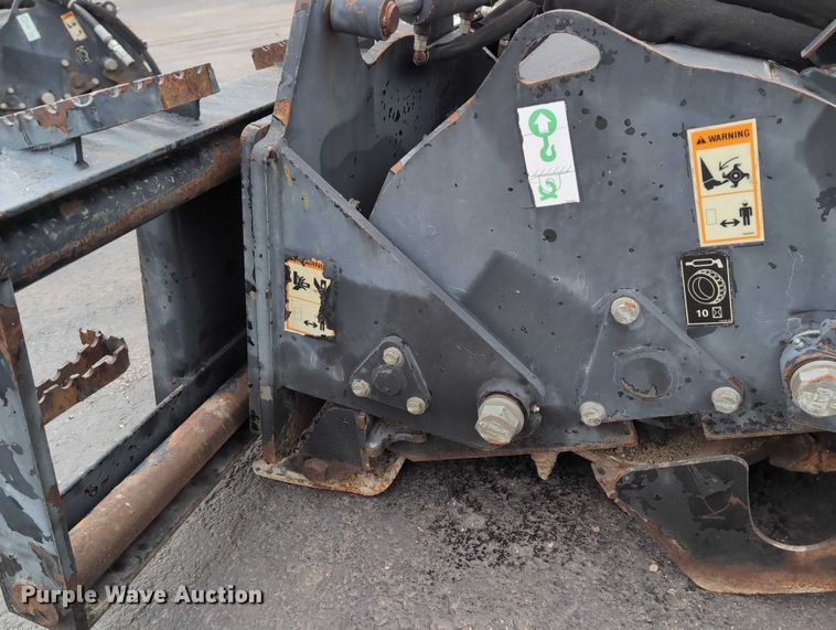 image for item DV0802 2000 Caterpillar PC6 skid steer cold planer