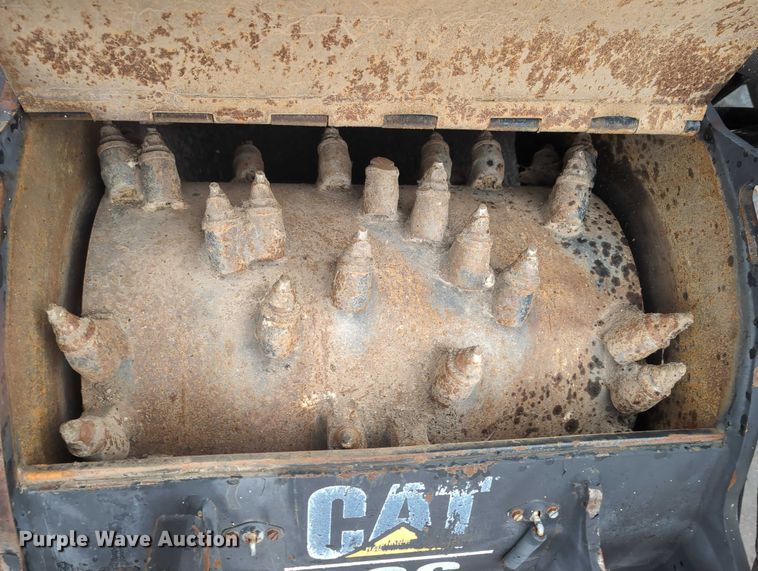 image for item DV0802 2000 Caterpillar PC6 skid steer cold planer