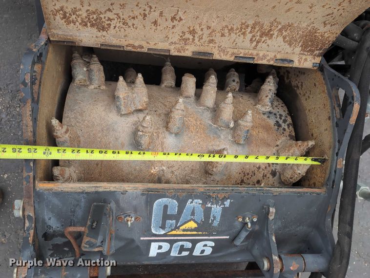 image for item DV0802 2000 Caterpillar PC6 skid steer cold planer