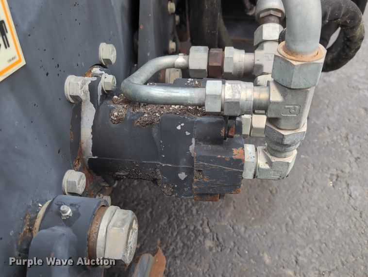 image for item DV0803 2000 Caterpillar PC9 skid steer cold planer