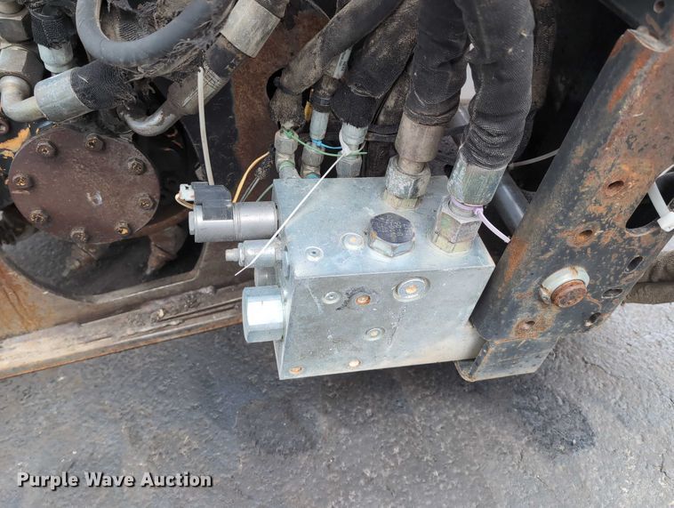 image for item DV0804 2005 Caterpillar PC210 skid steer cold planer