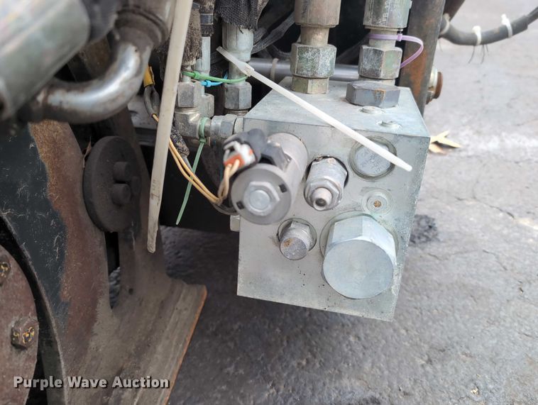 image for item DV0804 2005 Caterpillar PC210 skid steer cold planer