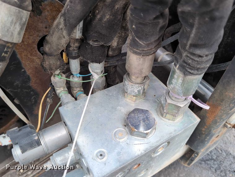 image for item DV0804 2005 Caterpillar PC210 skid steer cold planer