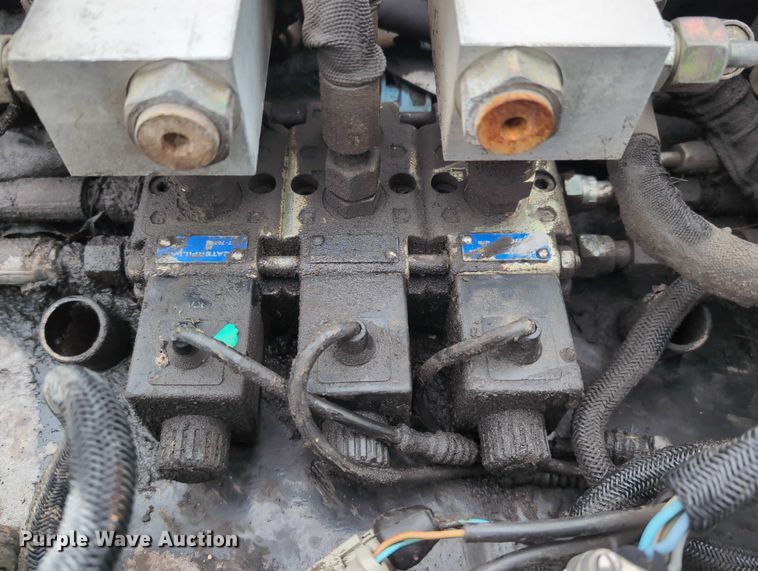 image for item DV0804 2005 Caterpillar PC210 skid steer cold planer