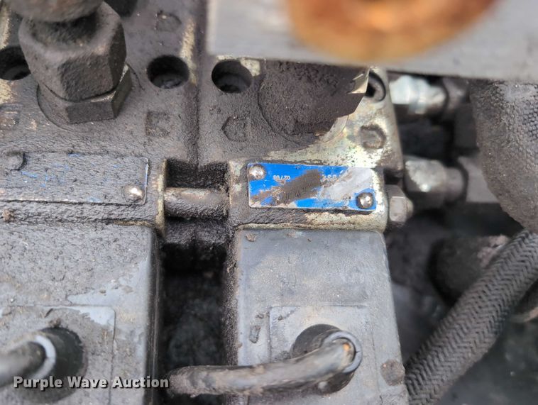 image for item DV0804 2005 Caterpillar PC210 skid steer cold planer