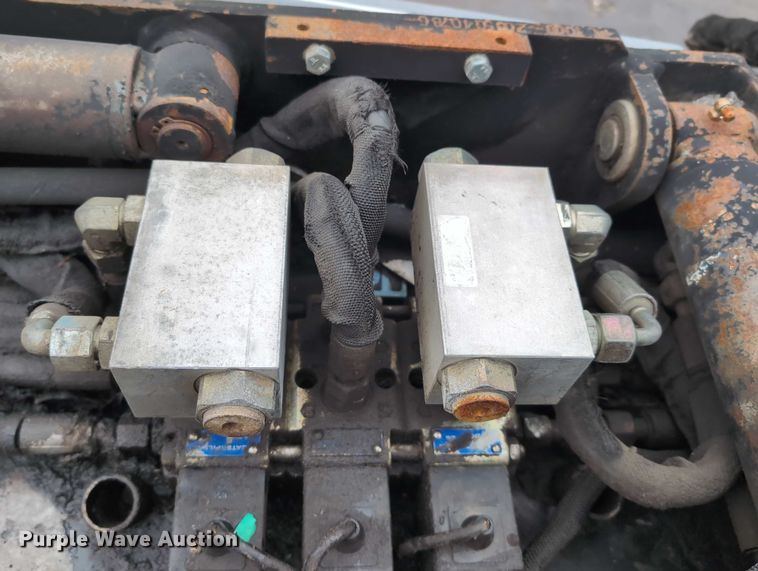 image for item DV0804 2005 Caterpillar PC210 skid steer cold planer