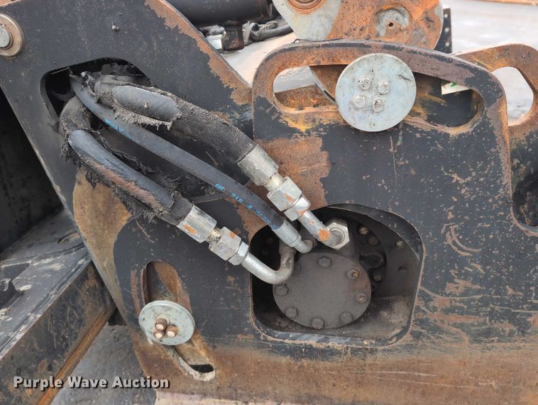 image for item DV0804 2005 Caterpillar PC210 skid steer cold planer