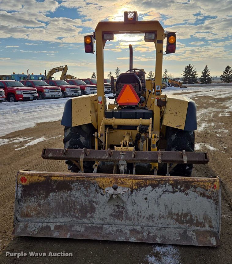 image for item EB1317 2000 John Deere 210LE landscape tractor