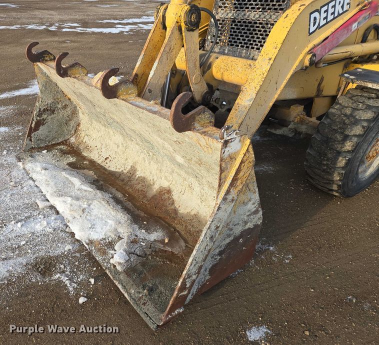 image for item EB1317 2000 John Deere 210LE landscape tractor