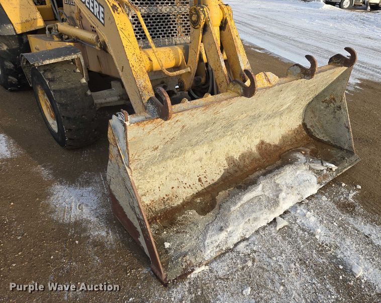 image for item EB1317 2000 John Deere 210LE landscape tractor