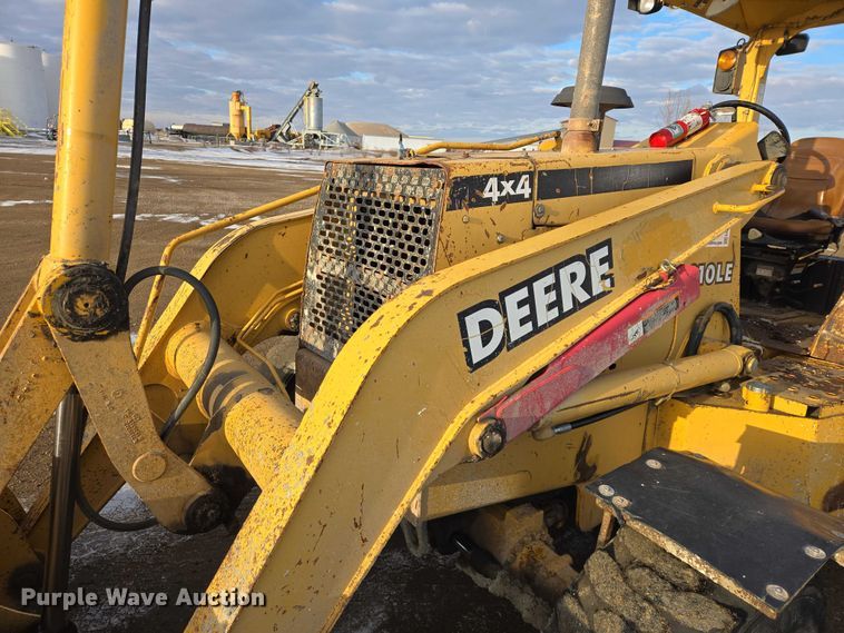 image for item EB1317 2000 John Deere 210LE landscape tractor