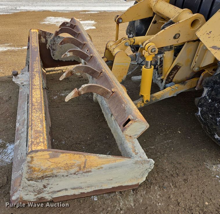 image for item EB1317 2000 John Deere 210LE landscape tractor