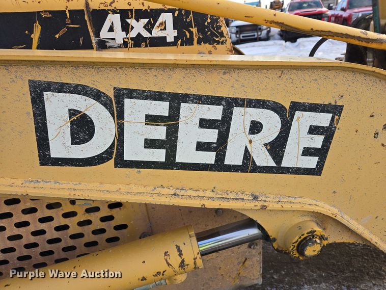 image for item EB1317 2000 John Deere 210LE landscape tractor