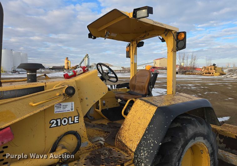 image for item EB1317 2000 John Deere 210LE landscape tractor