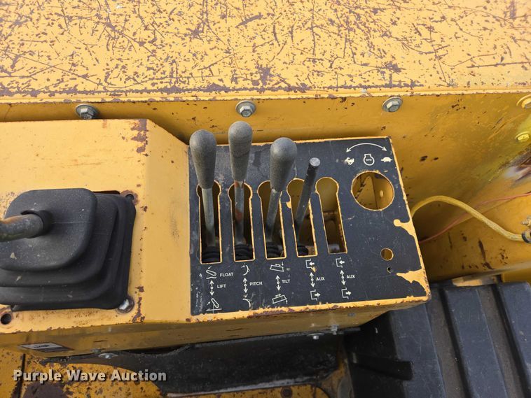 image for item EB1317 2000 John Deere 210LE landscape tractor