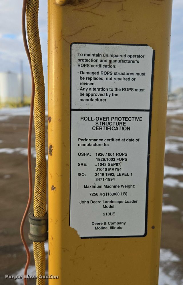 image for item EB1317 2000 John Deere 210LE landscape tractor