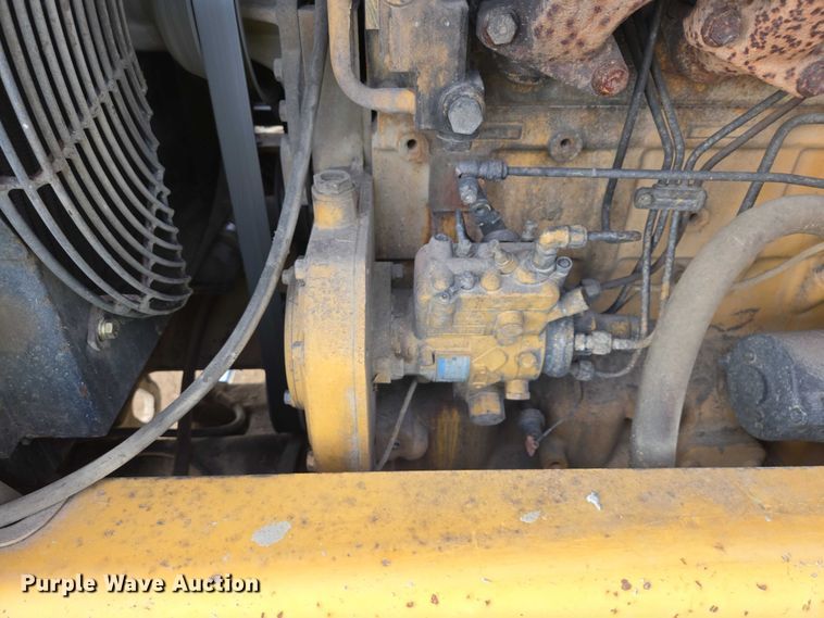 image for item EB1317 2000 John Deere 210LE landscape tractor