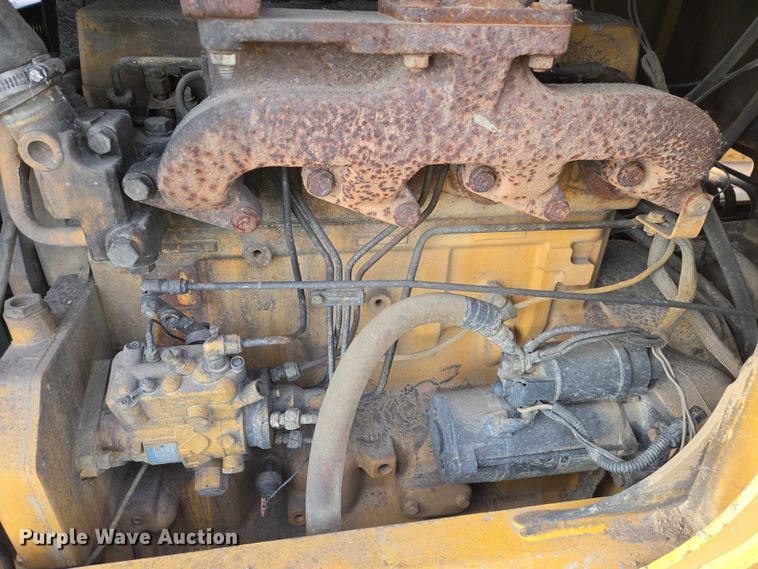 image for item EB1317 2000 John Deere 210LE landscape tractor