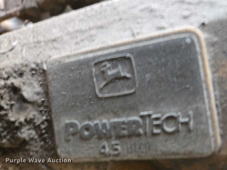 image for item EB1317 2000 John Deere 210LE landscape tractor