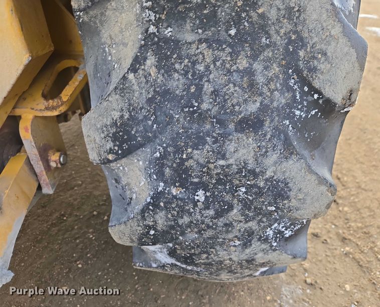 image for item EB1317 2000 John Deere 210LE landscape tractor