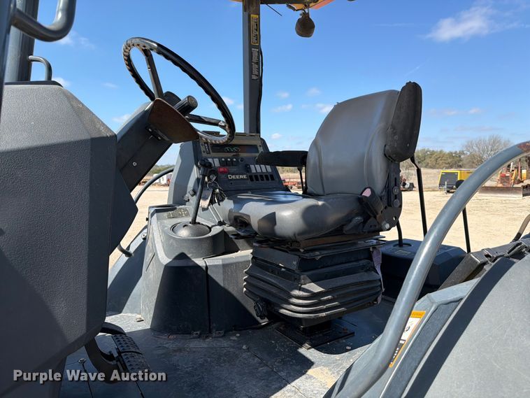 image for item ED5138 2013 John Deere 310K backhoe