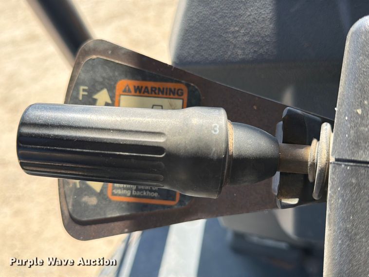 image for item ED5138 2013 John Deere 310K backhoe