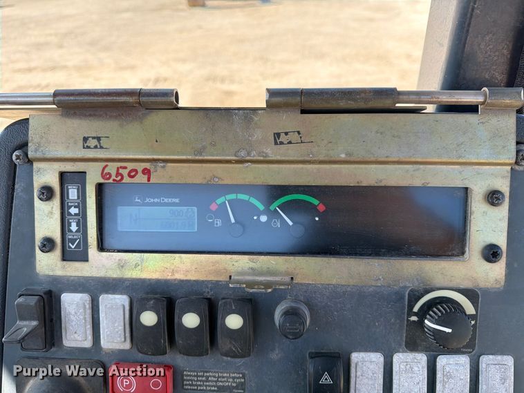 image for item ED5138 2013 John Deere 310K backhoe