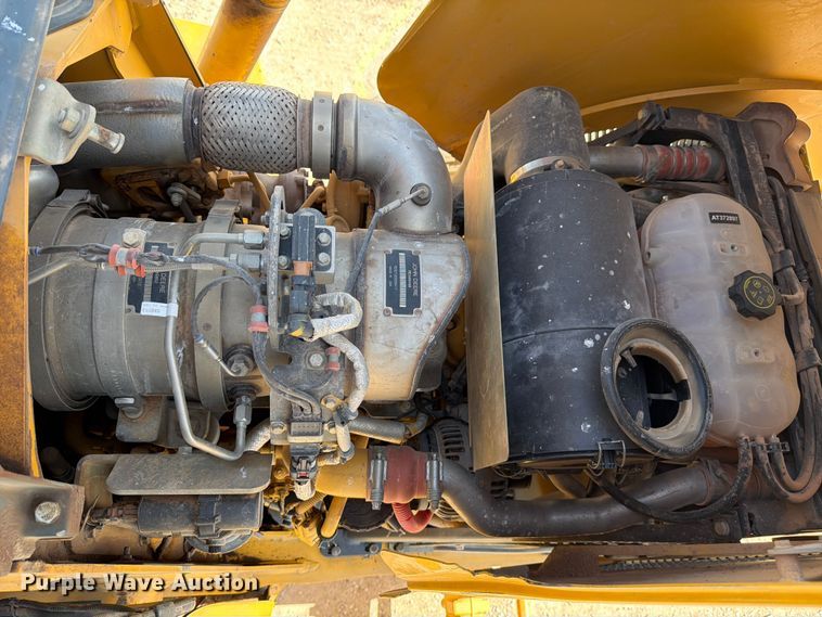 image for item ED5138 2013 John Deere 310K backhoe