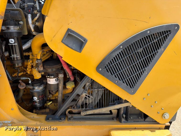 image for item ED5138 2013 John Deere 310K backhoe