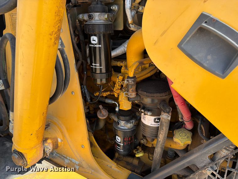 image for item ED5138 2013 John Deere 310K backhoe