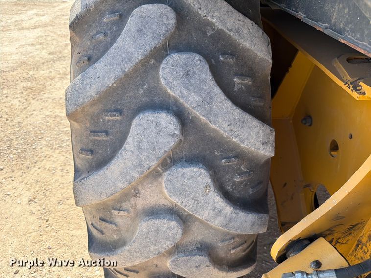 image for item ED5138 2013 John Deere 310K backhoe