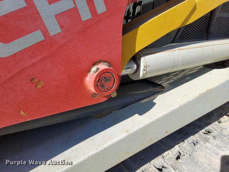 image for item EO7021 2013 Takeuchi  TL12 tracked skid steer loader