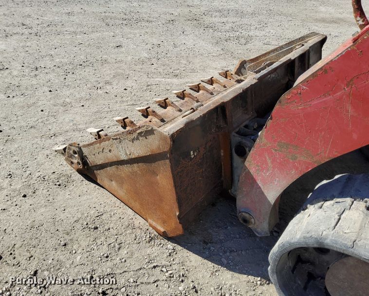 image for item EO7021 2013 Takeuchi  TL12 tracked skid steer loader