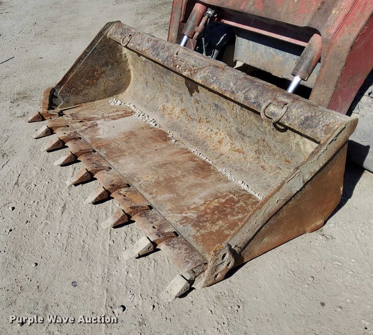 image for item EO7021 2013 Takeuchi  TL12 tracked skid steer loader