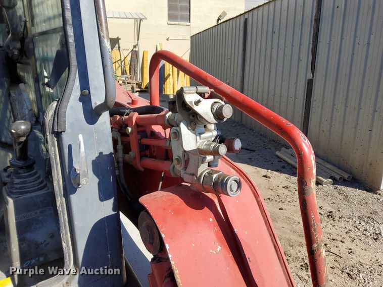 image for item EO7021 2013 Takeuchi  TL12 tracked skid steer loader