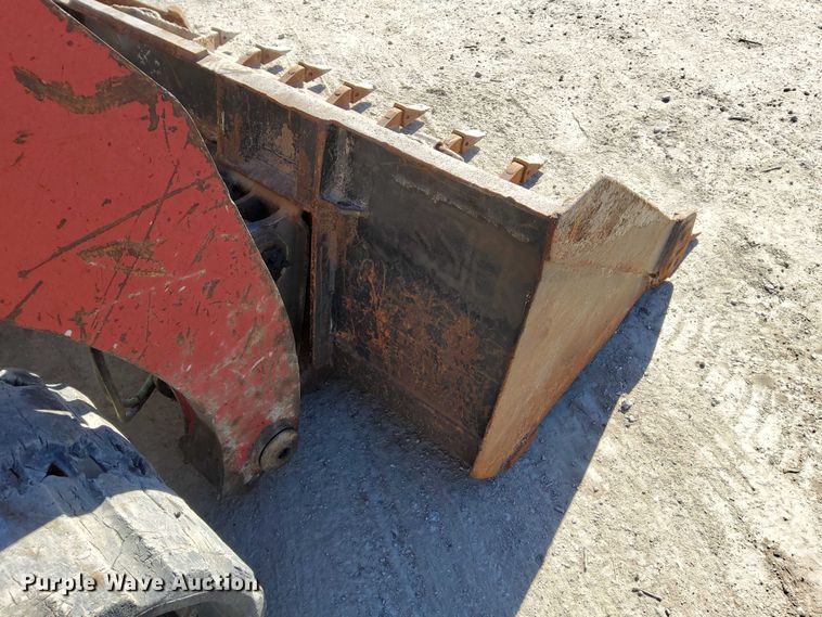 image for item EO7021 2013 Takeuchi  TL12 tracked skid steer loader