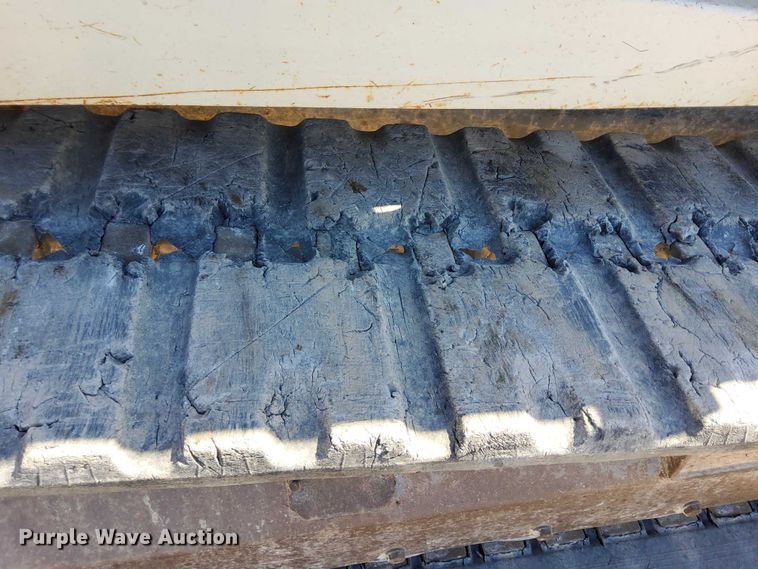 image for item EO7021 2013 Takeuchi  TL12 tracked skid steer loader