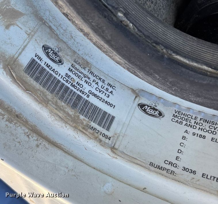 image for item FB3075 2007 Mack CV713 roll-off container truck