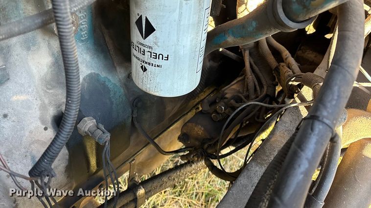 image for item FG0093 2001 International 4700 flatbed truck