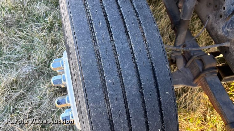 image for item FG0093 2001 International 4700 flatbed truck