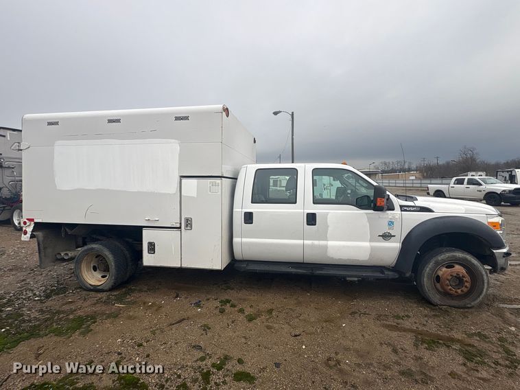 image for item YA2132 2016 Ford F550 Super Duty Crew Cab chipper truck