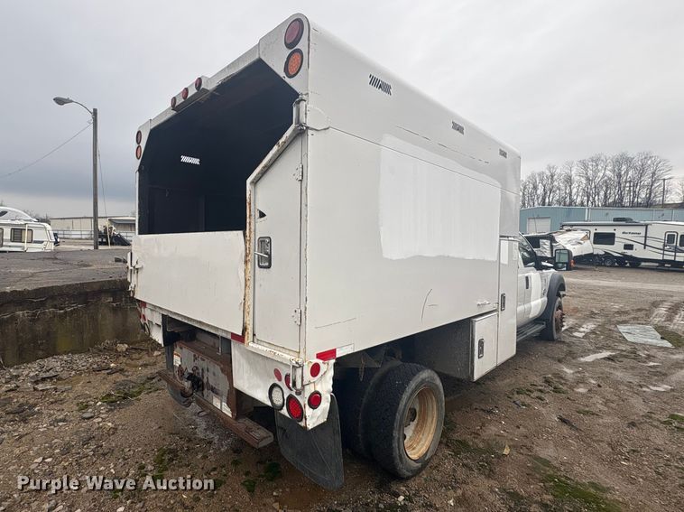 image for item YA2132 2016 Ford F550 Super Duty Crew Cab chipper truck