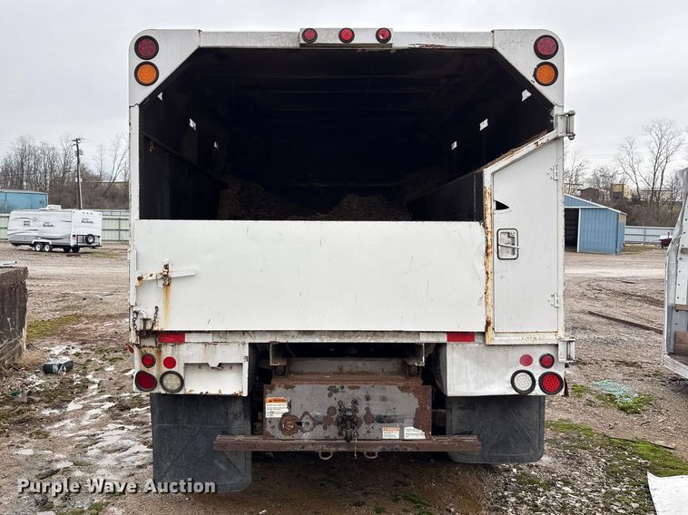 image for item YA2132 2016 Ford F550 Super Duty Crew Cab chipper truck